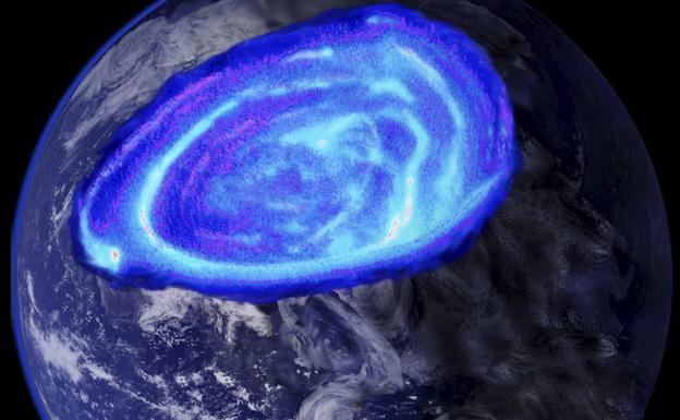 Reproducción artística de la aurora oval que se forma con la convergencia entre el campo magnético débil y el fuerte viento solar. 