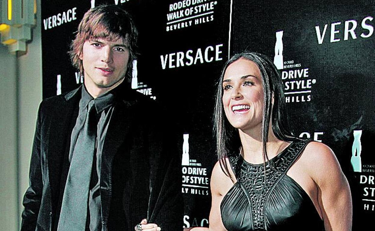 Demi Moore y Asthon Kutcher, en una fiesta en Beverly Hills.