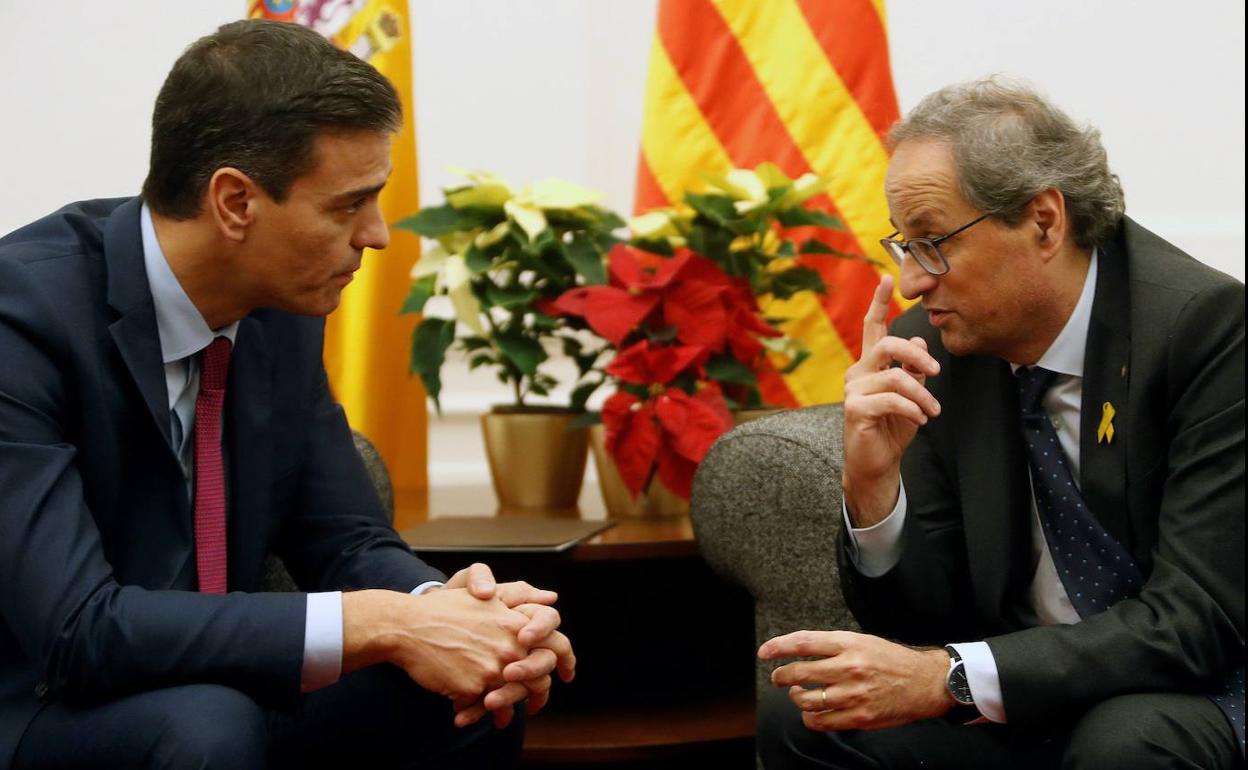 Pedro Sánchez y Quim Torra, durante su encuentro de hace un año en Barcelona.