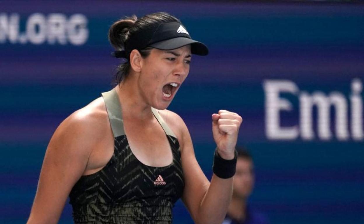 Garbiñe Muguruza celebra su victoria ante Victoria Azarenka. 