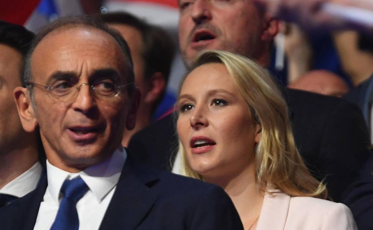 El candidato ultraderechista Éric Zemmour y detrás suyo Marion Maréchal, sobrina de Marine Le Pen.