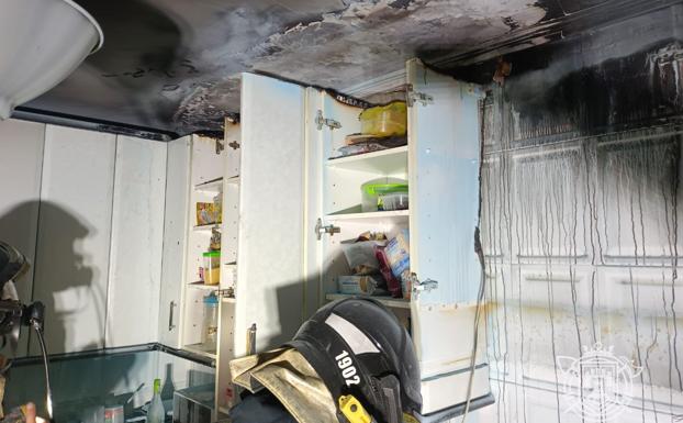 Imagen principal - Cocina incendiada.