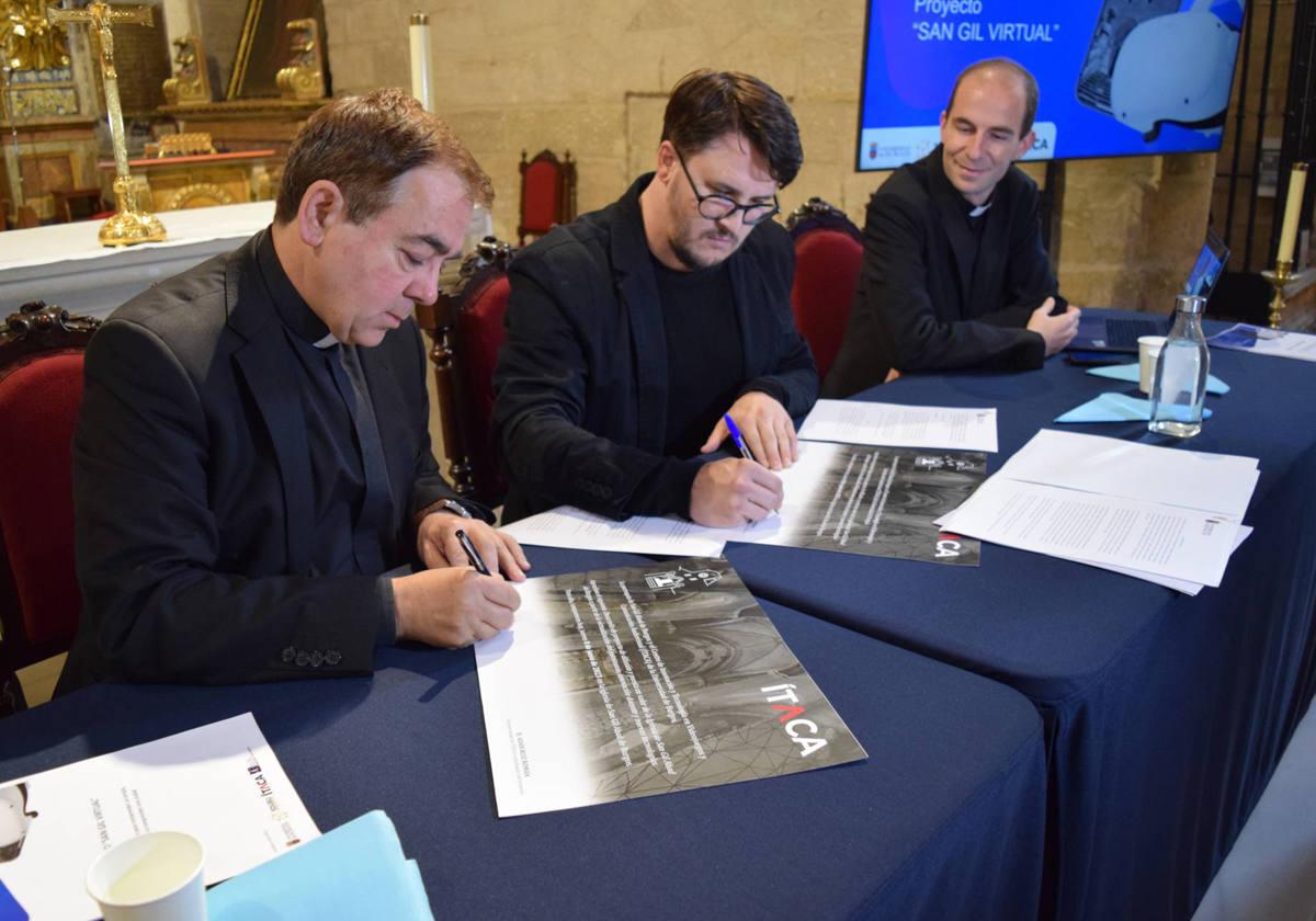 Firma del acuerdo entre la parroquia de San Gil Abad y la Universidad de Burgos.