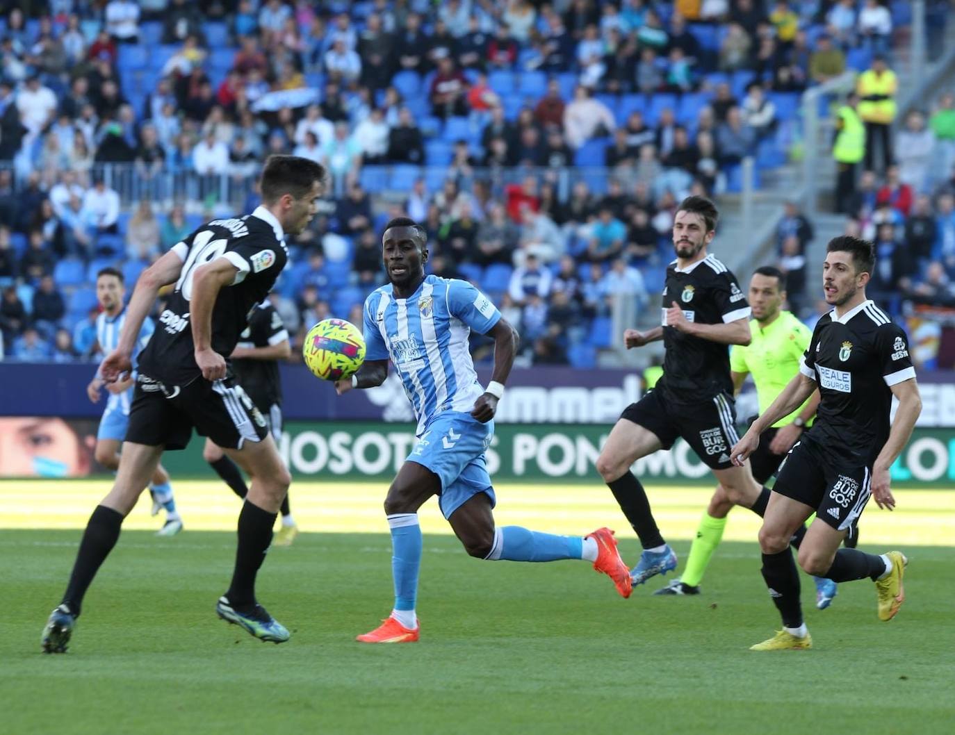 Imágenes del empate entre el Málaga CF y el Burgos CF disputado en La Rosaleda