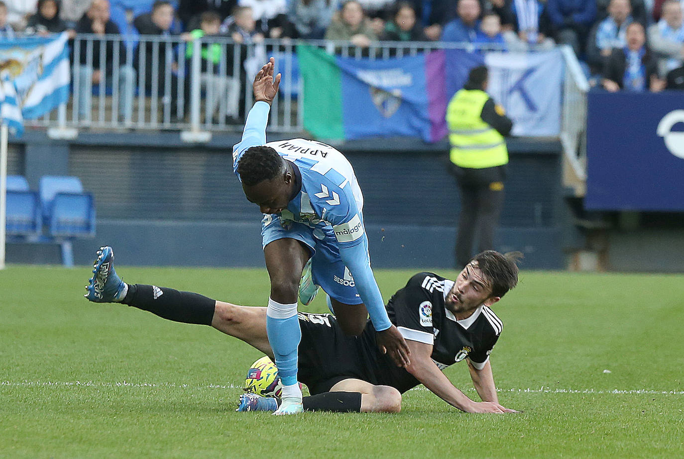 Imágenes del empate entre el Málaga CF y el Burgos CF disputado en La Rosaleda