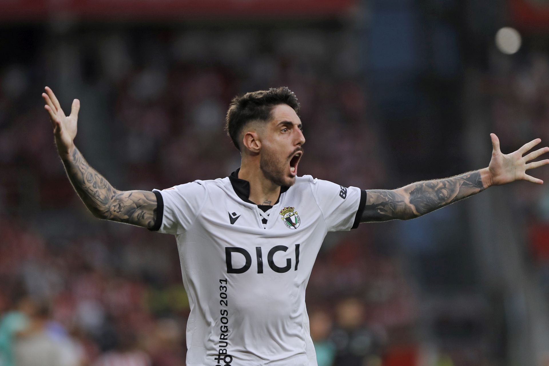 Todas las imágenes del partido entre el Sporting de Gijón y el Burgos CF