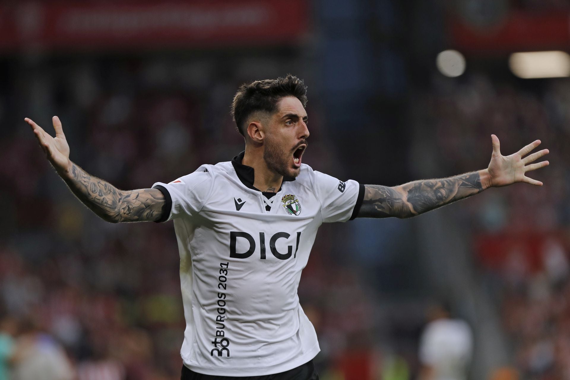 Todas las imágenes del partido entre el Sporting de Gijón y el Burgos CF