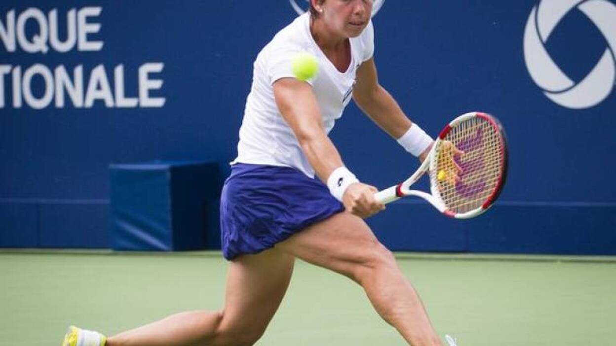 Carla Suárez da la campanada al eliminar a Sharapova en tres sets