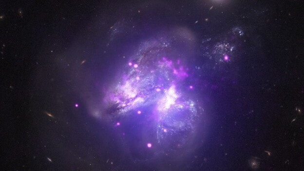 Arp 299. Un &#039;goulash&#039; galáctico a 140 millones de años luz