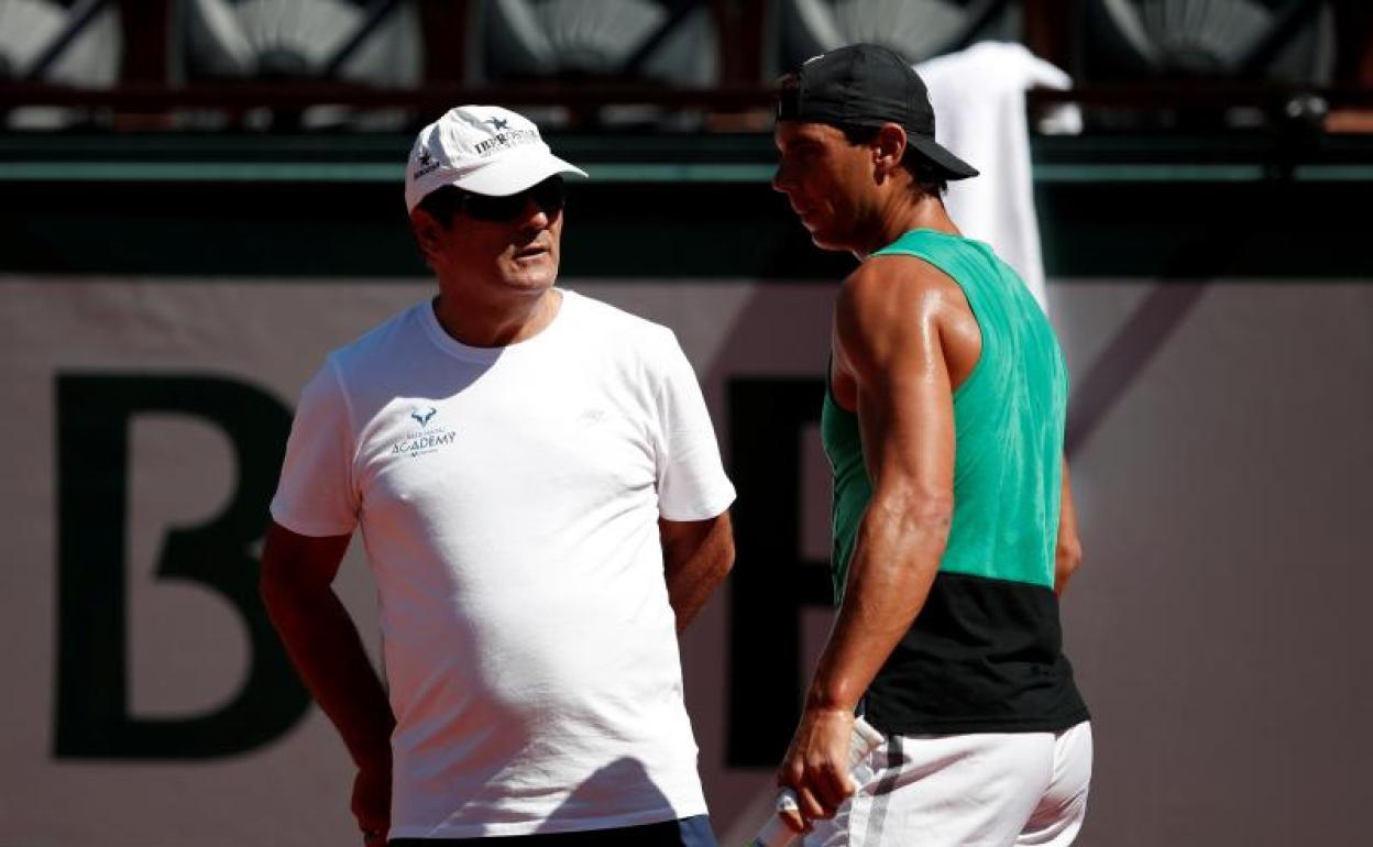 Toni Nadal y Rafa Nadal, durante un partido. 
