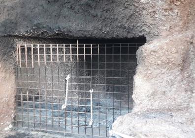 Imagen secundaria 1 - El Cabildo recupera y cierra las Cuevas de los Canarios en El Confital tras el desalojo del último okupa