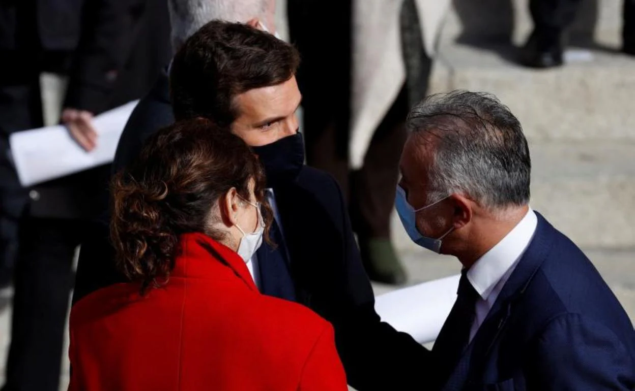 Isabel Díaz Ayuso, Pablo Casado y Ángel Víctor Torres ayer en Madrid durante el acto de la Constitución. 