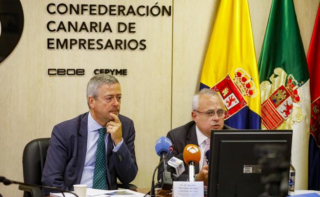 Los dirigentes de la CCE, Agustín Manrique de Lara y José Cristóbal García (d). /C7