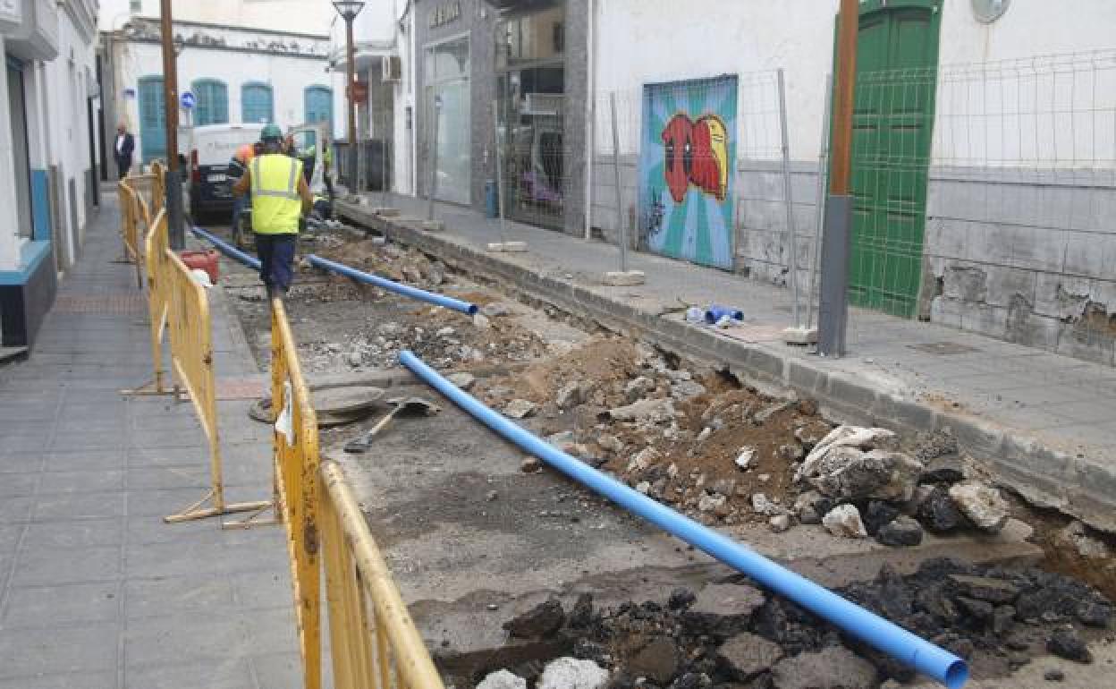 Arreglo de canalización en Arrecife en imagen de archivo. 