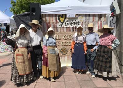Imagen secundaria 1 - La trasquila es el acto estrella de la Fiesta de la Lana. En las imágenes, representantes de Surco y Arado, y dos momentos de la trasquila, a mano y a máquina. 