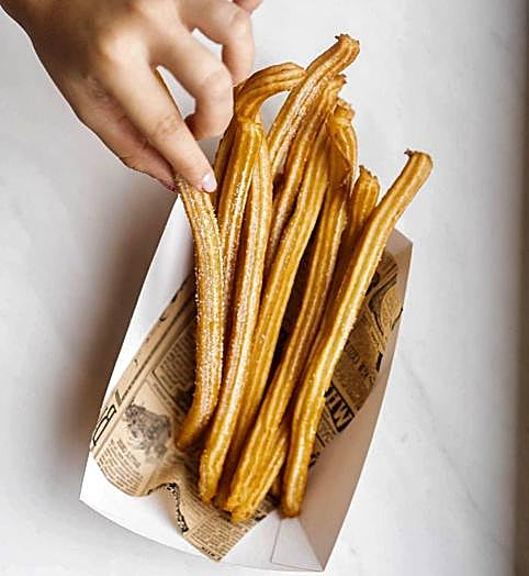 Churros con azúcar de + que Xurros Café