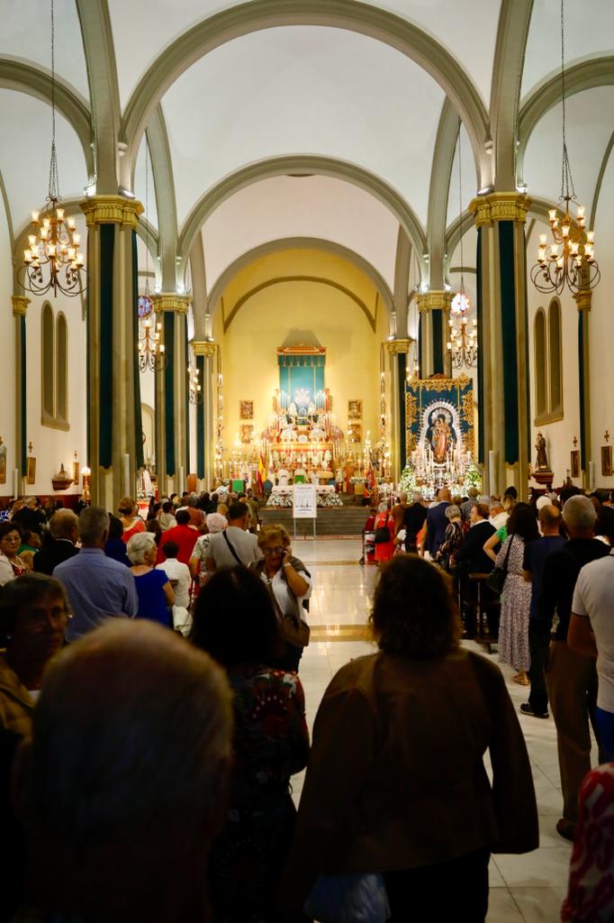 La procesión de La Naval, en imágenes