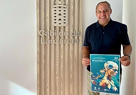 Juan Monzón, con el cartel de la prueba.