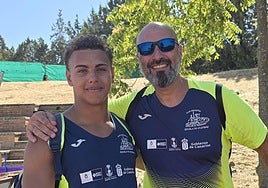 Magno Llopis junto a su entrenador David Montelongo.