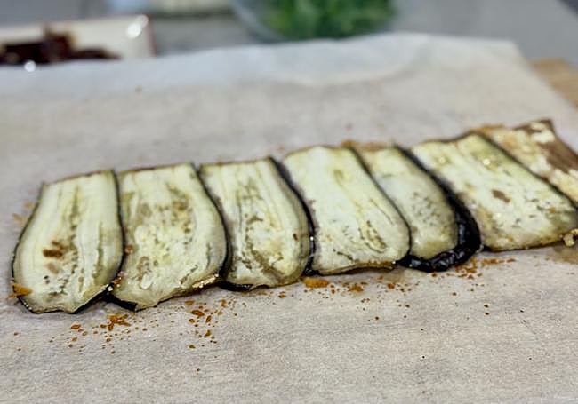 Volteamos la capa de berenjenas