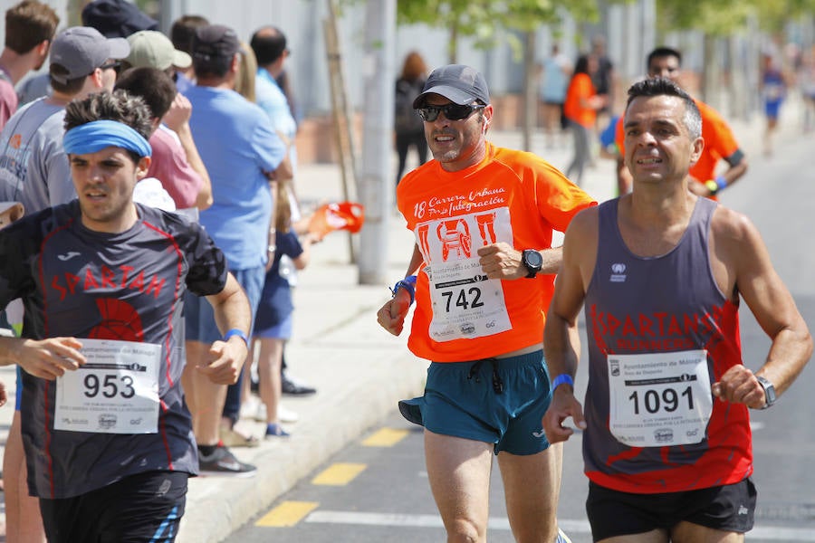 La 18 Carrera Urbana por la Integración en el Parque de Huelin, en imágenes