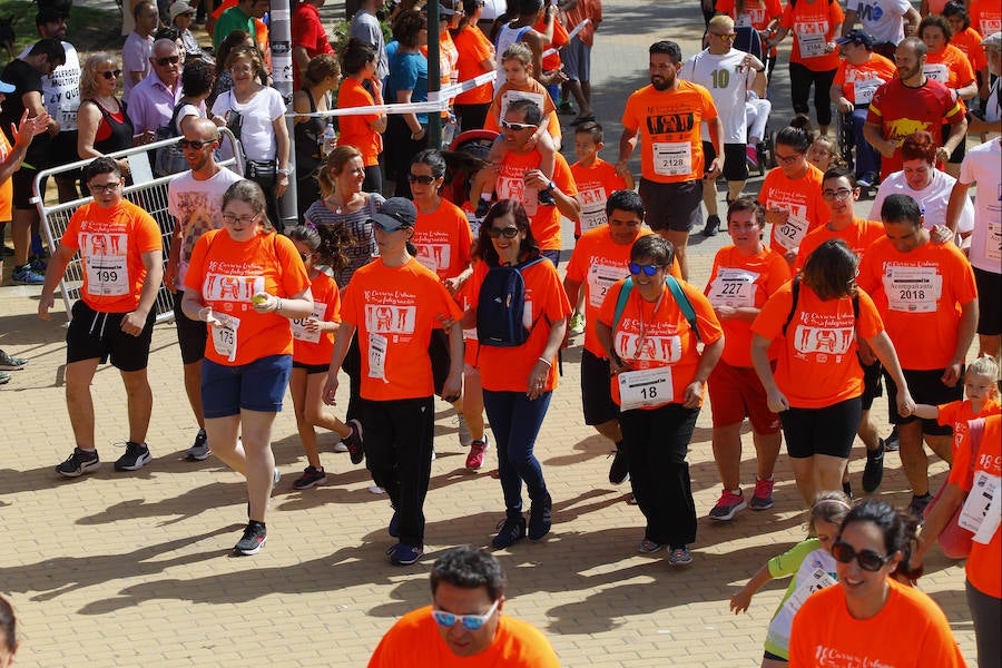 La 18 Carrera Urbana por la Integración en el Parque de Huelin, en imágenes