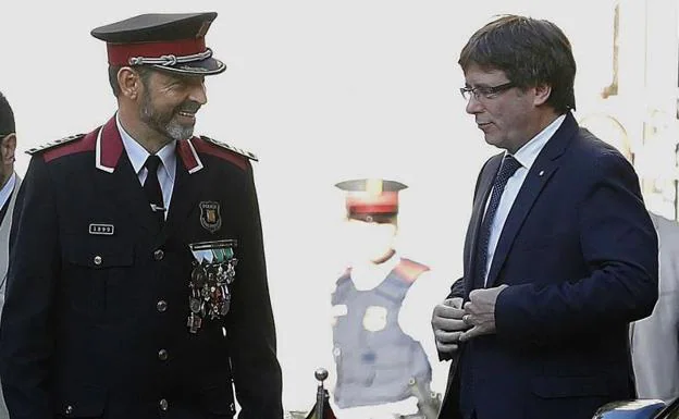 Trapero y Puigdemont.