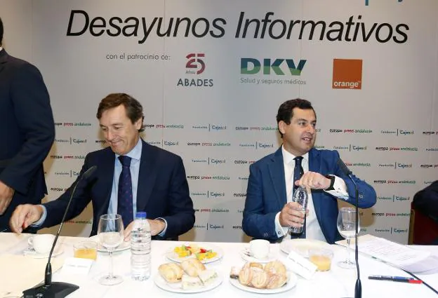 El portavoz del PP en el Congreso, Rafael Hernando, y el presidente del PP andaluz, Juanma Moreno.