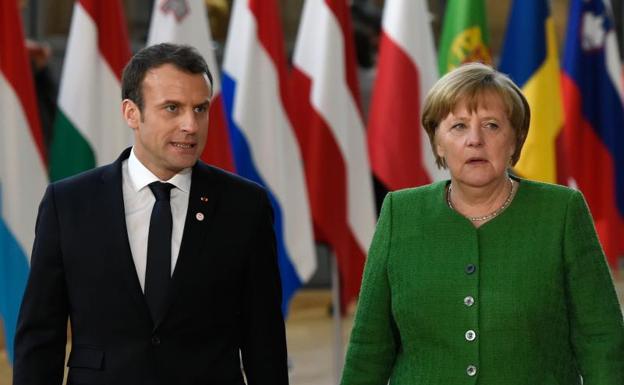 Emmanuel Macron y Angela Merkel.