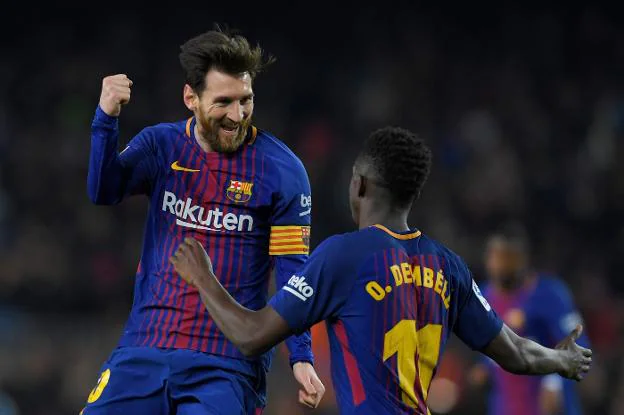 Messi y Dembéle, tras un gol al Girona el sábado. :: afp