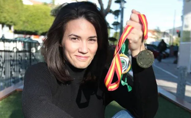 María García, con sus últimas medallas