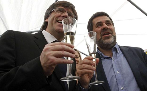 Puigdemont y Jordi Sànchez.