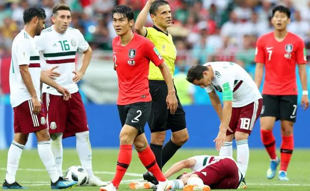 Lance del partido entre Corea del Sur y México.