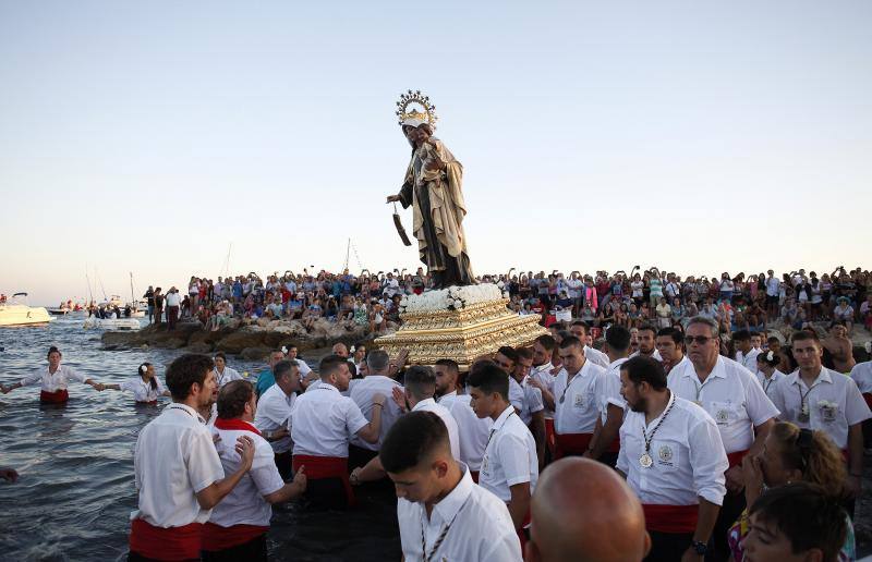 Celebración de la festividad y procesión en El Palo