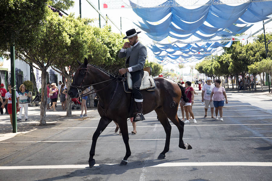 Fotos: Las mejores imágenes del primer domingo de la Feria de Málaga 2018