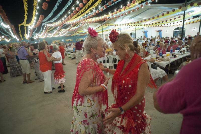 Las mejores imágenes de la tercera jornada de fiesta en la capital: la noche, en el Cortijo de Torres