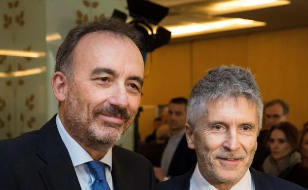 Manuel Marchena, presidente del tribunal del 'procés, junto al ministro del Interior, Fernando Grande-Marlaska 