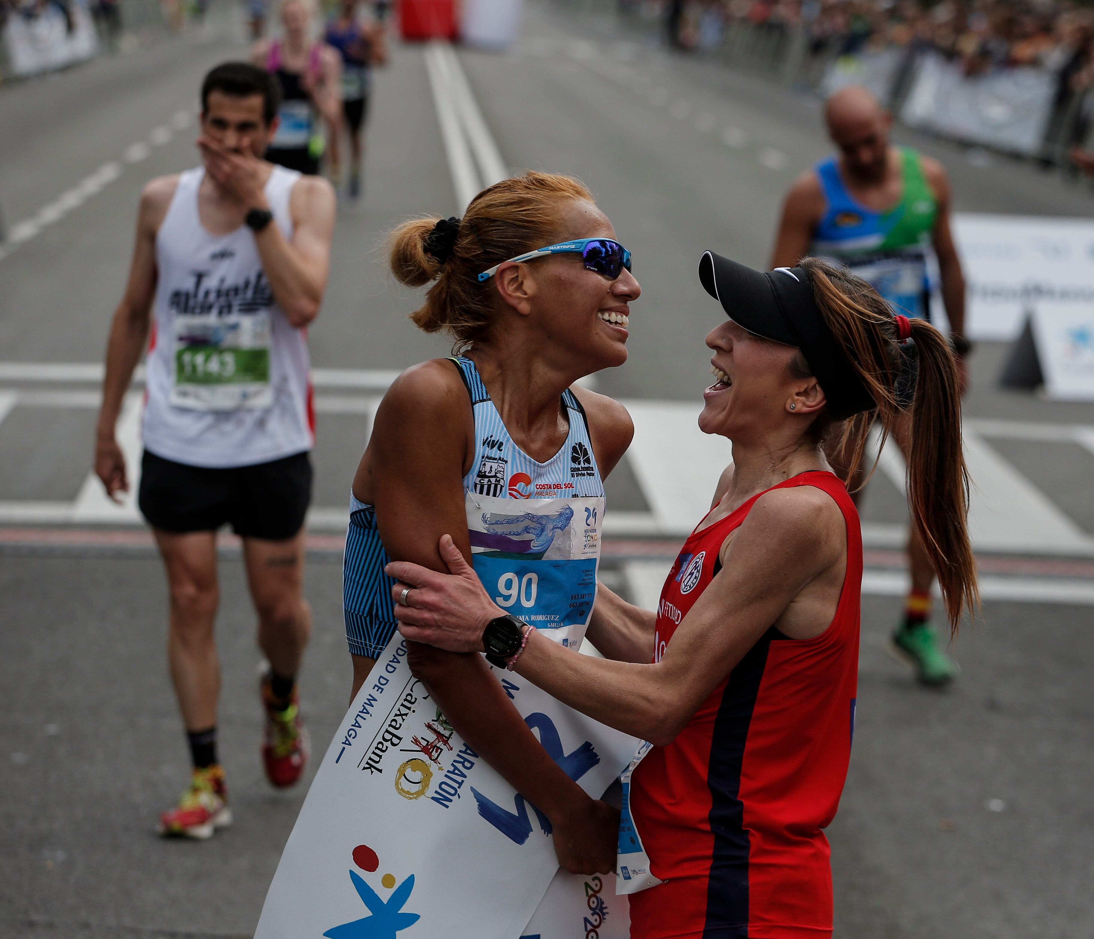 Mucho ambiente y color han llenado hoy las calles del centro de Málaga en la Media Maratón Teatro Soho Caixabank Ciudad de Málaga 2019