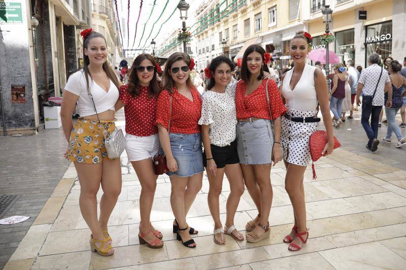 Miles de personas apuran las últimas horas de fiesta tanto en el Centro como en el Real. 