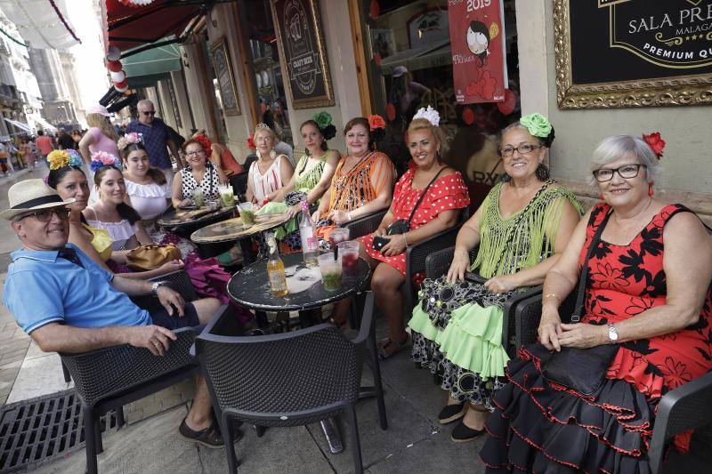 Miles de personas apuran las últimas horas de fiesta tanto en el Centro como en el Real. 