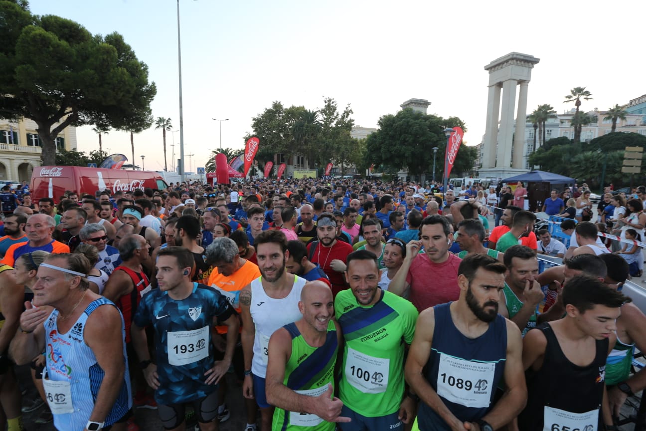 Las fotoas de la III edición de la Carrera Popular de la Policía Nacional en Málaga capital