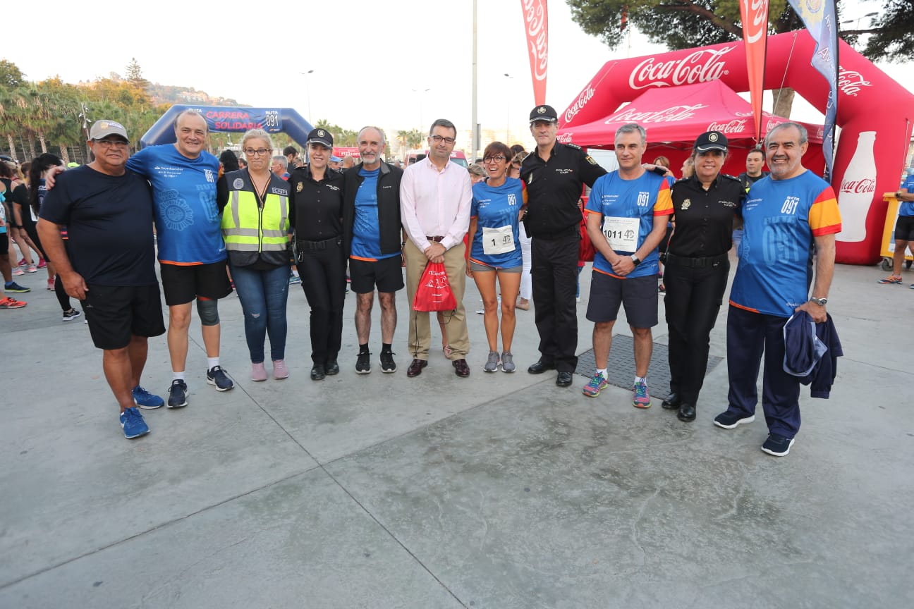 Las fotoas de la III edición de la Carrera Popular de la Policía Nacional en Málaga capital