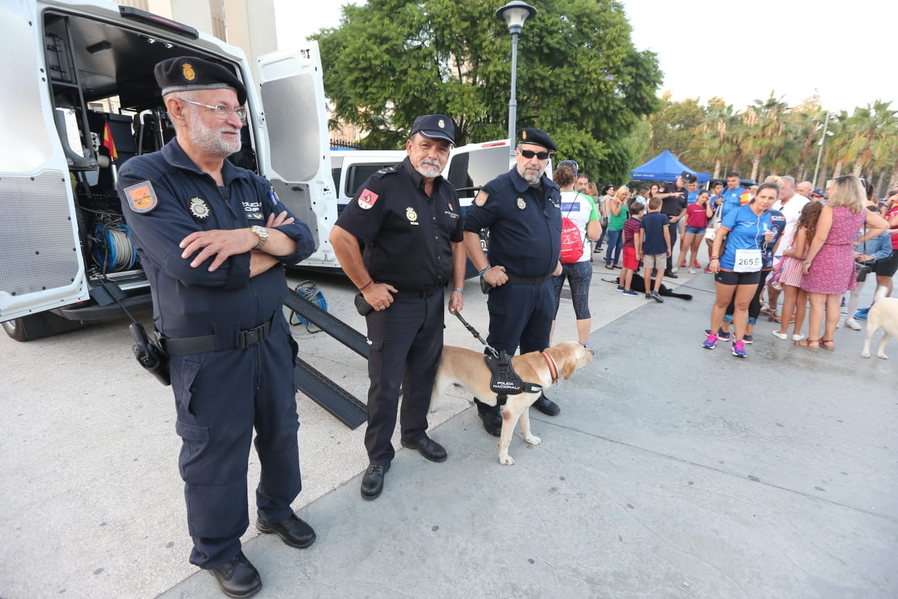 Las fotoas de la III edición de la Carrera Popular de la Policía Nacional en Málaga capital