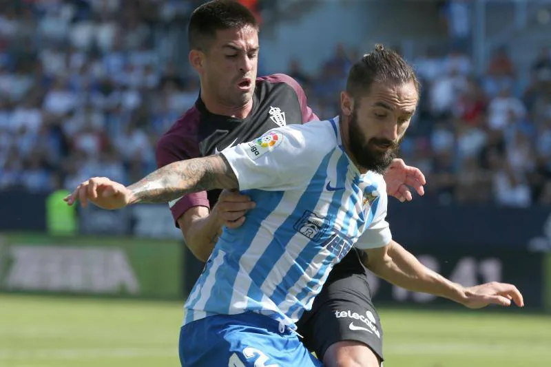 El partido en la Rosaleda entre el Málaga y el Sporting, en fotos