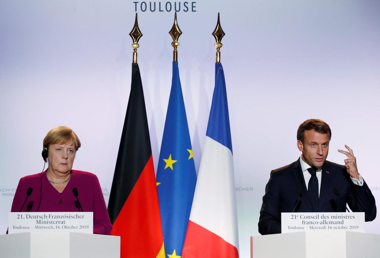 La canciller alemana, Ángela Merkel, junto al presidente francés, Emmanuel Macron, ayer en Toulouse. :: Reuters
