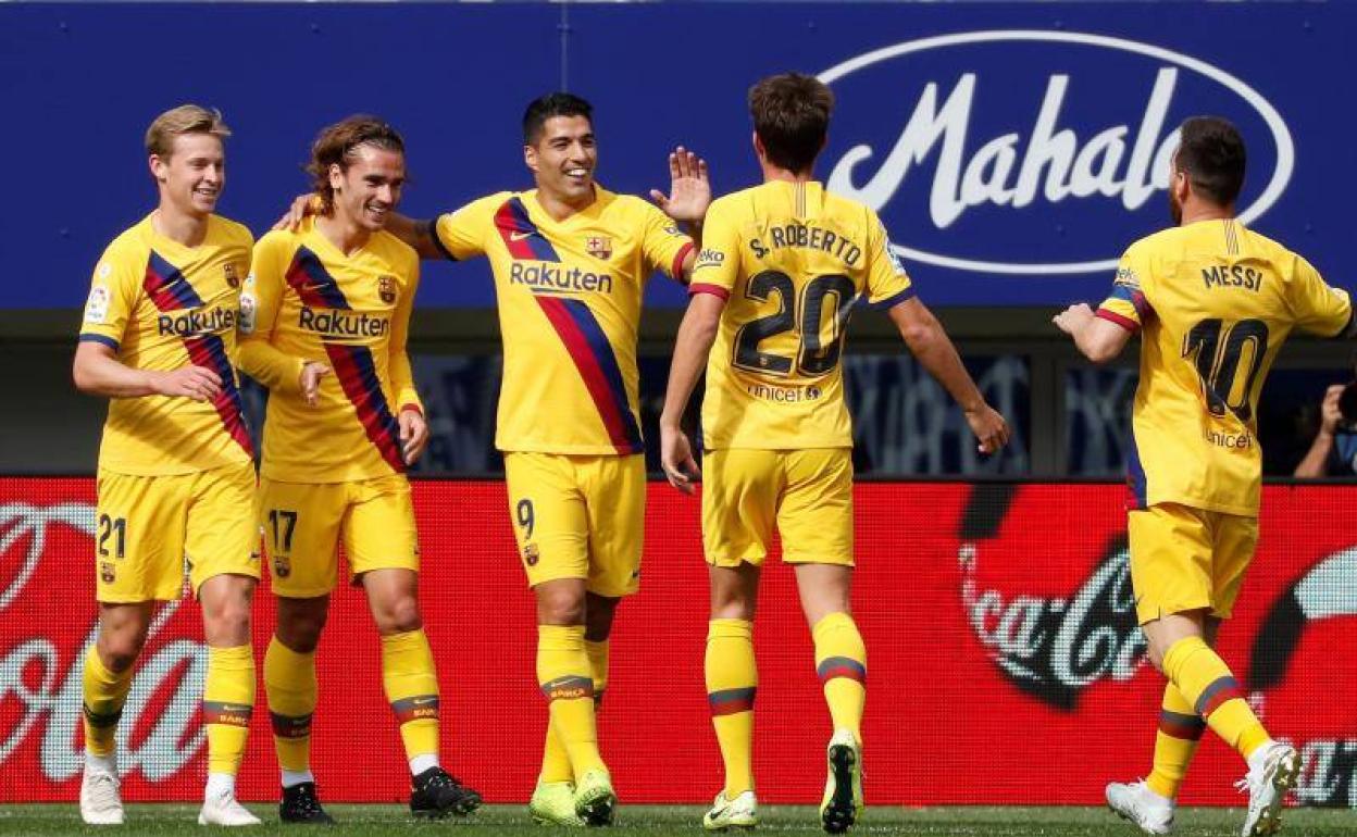 Los futbolistas del Barcelona celebrando el primer tanto de Griezmann.