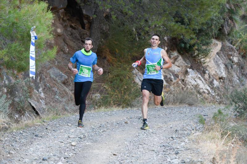 Imágenes de la 18ª edición del mítico recorrido por la sierra alhaurina donde han participado un total de 1.450 corredores 