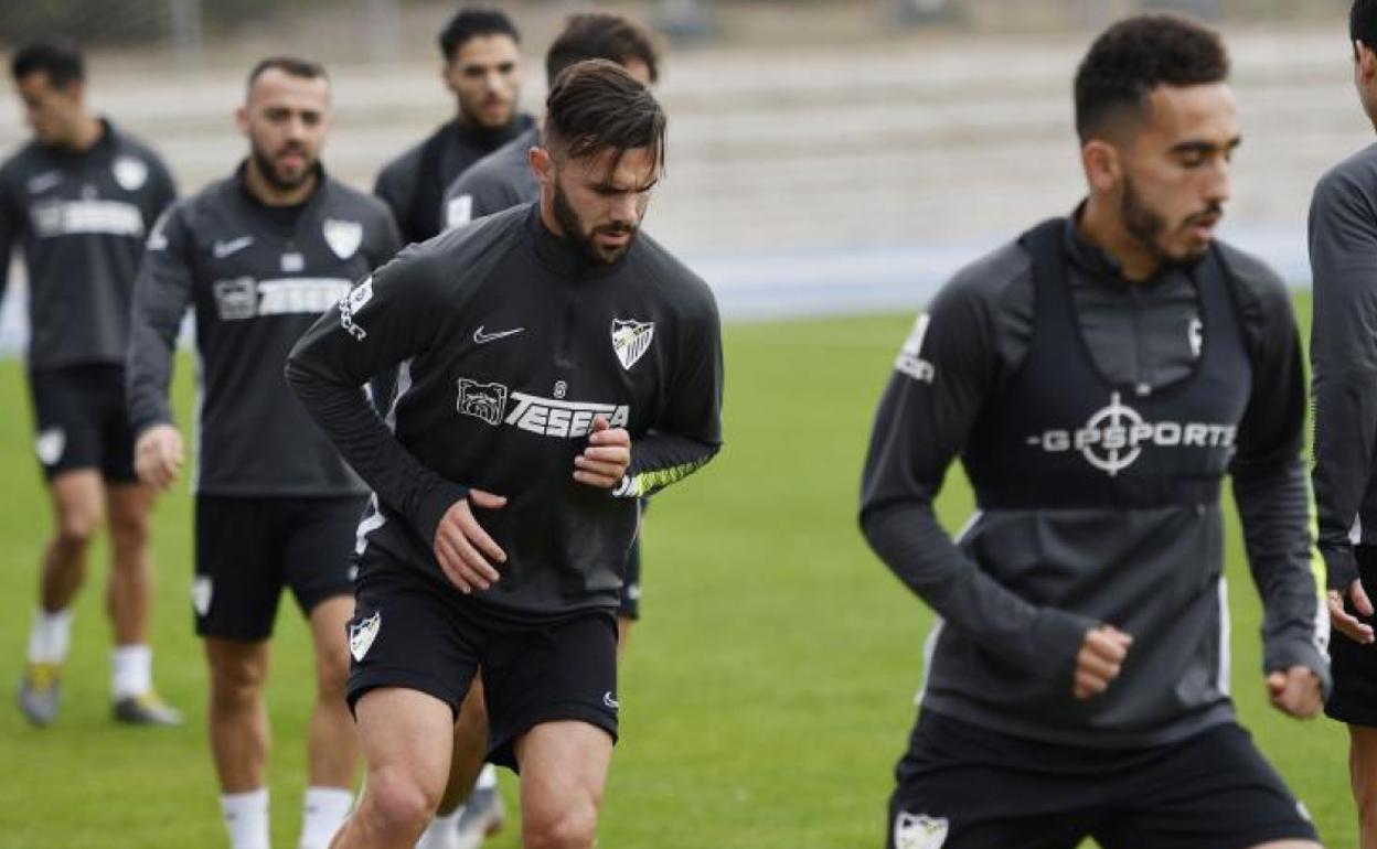 Sadiku, y Boulharoud por delante, durante el entrenamiento de este jueves con Keidi, Antoñín y Luis Hernández detrás.