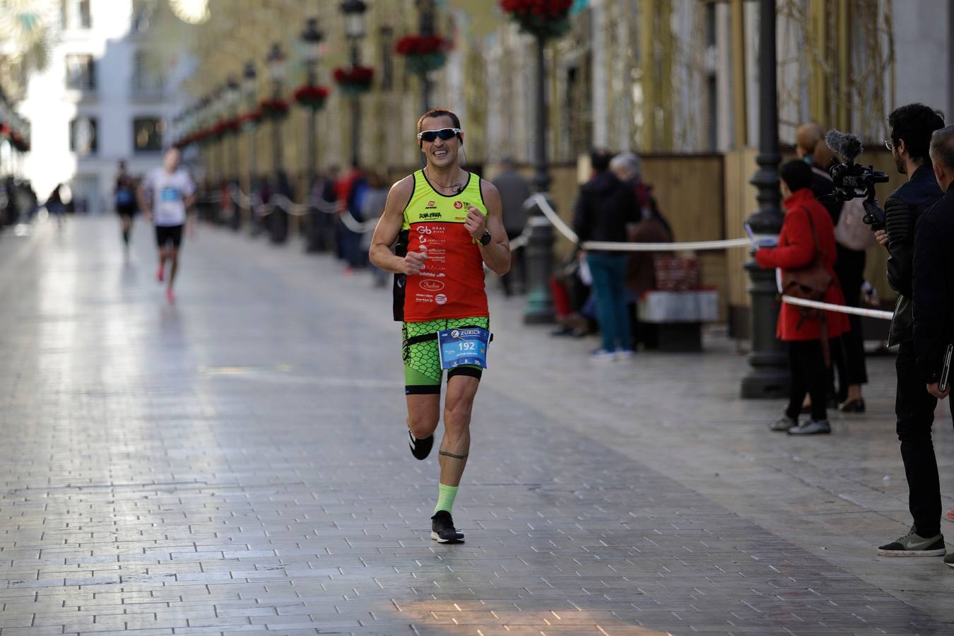 Los corredores, en calle Larios