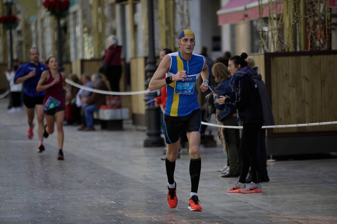 Los corredores, en calle Larios